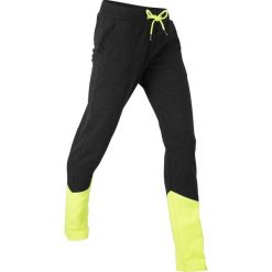 Spodnie dresowe, długie, z kolekcji Maite Kelly, Level 1 bonprix czarno-żółty neonowy melanż. Czarne spodnie dresowe damskie bonprix, melanż, z dresówki. Za 74.99 zł.