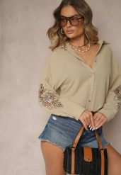 Beżowa Koszula o Fasonie Oversize z Haftowanymi Zdobieniami Dovelissa. Brązowe koszule damskie Renee, l, z aplikacjami, biznesowe, bez kołnierzyka, bez ramiączek. Za 74.99 zł.