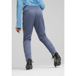 Młodzieżowe spodnie treningowe Manchester City PUMA Inky Blue Magic. Niebieskia spodnie dresowe damskie Puma, m, bez wzorów, z dresówki. W wyprzedaży za 189.00 zł.