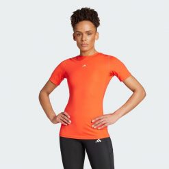 Koszulka Techfit Training. Czarne bluzki damskie Adidas, m, bez wzorów, z dzianiny, bez kołnierzyka, bez ramiączek. Za 169.00 zł.