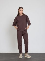 BGN Spodnie dresowe w kolorze brązowym rozmiar: 38. Brązowe spodnie dresowe damskie BGN, bez wzorów, z dresówki. Za 108.99 zł.