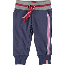 Spodnie dresowe w kolorze granatowym. Niebieskie spodnie niemowlęce Beebielove, z bawełny. W wyprzedaży za 37.95 zł.