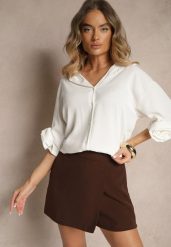 Biała Koszula Ozdobiona Kwiatami 3DTenisela. Białe koszule damskie Renee, bez wzorów, z jeansu, klasyczne, bez kołnierzyka, bez ramiączek. Za 54.99 zł.