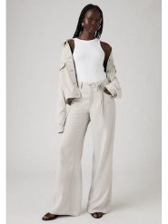 Levi's Spodnie - Comfort fit - w kolorze kremowym rozmiar: W30/L31. Brązowe spodnie materiałowe damskie Levi's, bez wzorów, z materiału. Za 218.05 zł.