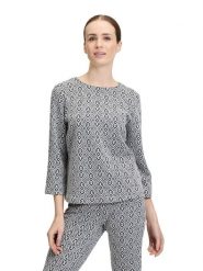 CARTOON Bluzka w kolorze biało-granatowym rozmiar: 36. Białe bluzki damskie Cartoon, bez wzorów, bez kołnierzyka, bez ramiączek. Za 104.99 zł.