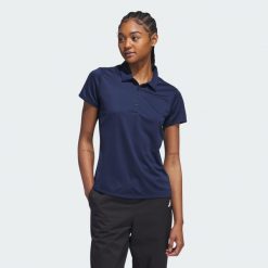 Koszulka polo Women's Solid Performance Short Sleeve. Czarne bluzki damskie Adidas, s, bez wzorów, z materiału, bez kołnierzyka, bez ramiączek. Za 229.00 zł.
