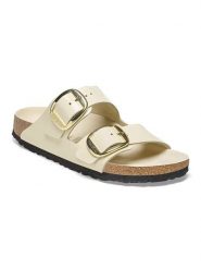 Birkenstock Skórzane klapki "Arizona" w kolorze kremowym rozmiar: 40. Brązowe klapki damskie Birkenstock, bez wzorów, z otwartym noskiem, bez obcasa, bez zapięcia. Za 608.45 zł.