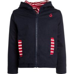 JoJo Maman Bébé REVERSIBLE ZIP Kardigan navy. Niebieskie swetry chłopięce JoJo Maman Bébé, z bawełny. Za 139.00 zł.