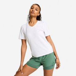 Koszulka fitness damska dekolt V. Białe bluzki damskie Decathlon, l, bez wzorów, z bawełny, sportowe, bez kołnierzyka, bez ramiączek. Za 44.99 zł.