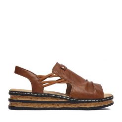 Sandały Rieker. Brązowe sandały damskie Rieker, bez wzorów, bez obcasa, na koturnie, bez zapięcia. Za 299.99 zł.