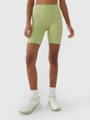 4F Szorty funkcyjne w kolorze żółtym rozmiar: M/L. Żółte spodenki sportowe damskie 4F, l, bez wzorów, z materiału, na fitness i siłownię. Za 33.95 zł.