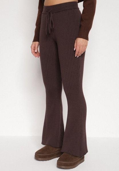 Brązowe Spodnie z Wiskozą i Wysokim Stanem Typu Dzwony Tusvira. Brązowe spodnie materiałowe damskie Born2be, bez wzorów, z jeansu. Za 129.99 zł.
