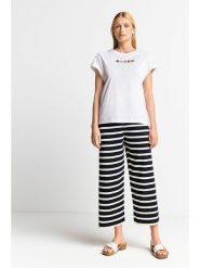 Rich & Royal Spodnie w kolorze biało-czarnym rozmiar: S. Białe spodnie materiałowe damskie Rich & Royal, bez wzorów, z materiału. Za 153.71 zł.