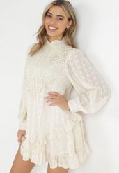 Jasnobeżowa Ażurowa Sukienka Mini ze Stójką i Falbankami Ranones. Brązowe sukienki damskie Born2be, w ażurowe wzory, z tkaniny, retro, bez ramiączek. W wyprzedaży za 175.99 zł.
