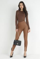 Brązowe Legginsy z Imitacji Skóry z Polarem i Rozcięciami Rosanne. Brązowe legginsy damskie Born2be, l, bez wzorów, z jeansu. Za 29.99 zł.