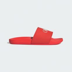 KLAPKI ADILETTE COMFORT AUDI REVOLUT F1 TEAM. Białe klapki damskie Adidas, bez wzorów, z materiału, bez obcasa, bez zapięcia. Za 239.00 zł.