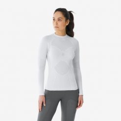 Koszulka termoaktywna narciarska damska Quechua BL 900 tech. Białe koszulki damskie WED'ZE, xs, bez wzorów, z elastanu, bez kołnierzyka, bez ramiączek. Za 179.99 zł.