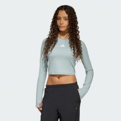 Koszulka Techfit Longsleeve. Białe koszulki damskie Adidas, bez wzorów, bez kołnierzyka, bez ramiączek. Za 129.00 zł.