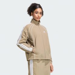 Kultowa bluza dresowa z tkaniny z 3 paskami. Zielone bluzy damskie Adidas, s, bez wzorów, z dresówki, bez kaptura. Za 329.00 zł.
