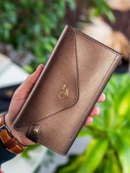 MORI Skórzany portfel w kolorze jasnobrązowym - 20 x 10 x 3 cm rozmiar: onesize. Brązowe portfele damskie MORI, bez wzorów, z materiału. Za 56.99 zł.