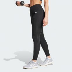 Długie legginsy Optimé Essentials Stash Pocket. Czarne legginsy damskie Adidas, xs, bez wzorów, z elastanu. Za 153.99 zł.