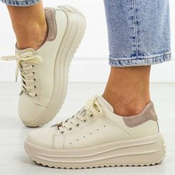 Beżowe skórzane sneakersy damskie na platformie Filippo Dp6739/25. Brązowe obuwie sportowe damskie Filippo, na jesień, z jeansu, bez zapięcia, trekkingowe. Za 239.00 zł.