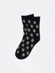 Skarpety damskie z wiskozy czarne Glamura 906. Czarne skarpetki damskie Big Star, bez wzorów, z materiału. W wyprzedaży za 13.99 zł.