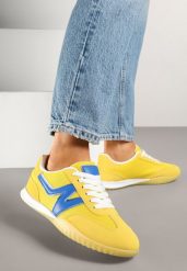 Żółte Sneakersy Typu Klasyczne Tenisówki Zdobione Przeszyciami Elanioria. Żółte obuwie sportowe damskie Renee, z aplikacjami, z jeansu, bez zapięcia. Za 79.99 zł.