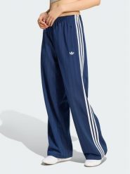 Adidas Spodnie dresowe 165468 Niebieski jasny Loose Fit. Niebieskie spodnie dresowe damskie Adidas, l, bez wzorów, z dresówki. Za 299.99 zł.