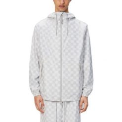 Kurtka RAINS STORM BREAKER W3 Biały. Białe kurtki damskie Rains, bez wzorów, z syntetyku, bez kaptura. Za 387.99 zł.