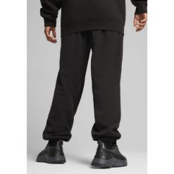Spodnie dresowe unisex Essentials Elevated PUMA Black. Czarne spodnie dresowe damskie Puma, s, bez wzorów, z dresówki. W wyprzedaży za 179.00 zł.