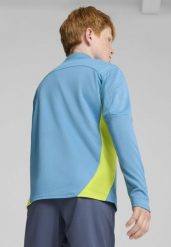 Młodzieżowa bluza treningowa Manchester City F.C. z zamkiem 1/4 PUMA. Niebieskia bluzy damskie Puma, m, bez wzorów, bez kaptura. Za 290.00 zł.