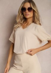 Beżowa Bluzka z Wykończeniami z Koronki i Dekoltem V Mallana. Brązowe bluzki damskie Renee, l, bez wzorów, z jeansu, eleganckie, bez kołnierzyka, bez ramiączek. Za 49.99 zł.