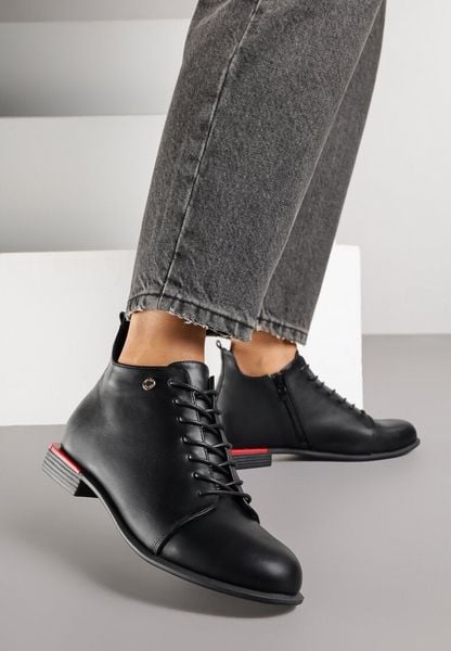 Czarne Botki Vices Trzewiki Aliff. Czarne botki damskie Renee, eleganckie, bez obcasa, na płaskiej podeszwie, bez zapięcia. Za 109.99 zł.