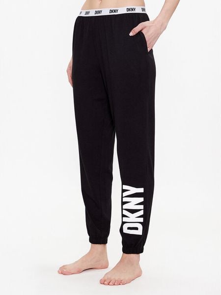 DKNY Spodnie piżamowe YI2822635 Czarny Regular Fit. Czarne piżamy damskie DKNY, bez wzorów, z bawełny, bez ramiączek. Za 199.99 zł.