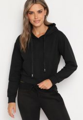 Czarna Bluza z Dodatkiem Bawełny z Kapturem Wykończona Ściągaczami Evista. Czarne bluzy damskie Born2be, l, bez wzorów, z bawełny, z kapturem. Za 39.99 zł.