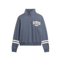 Bluza z zamkiem i naszywką dla kobiet Superdry Athletic Essentials. Niebieskie bluzy damskie Superdry, l, z aplikacjami, z bawełny, bez kaptura. Za 284.00 zł.