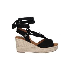 Eleganckie Czarne Skórzane Sandały Damskie - Rozmiar 39. Czarne sandały damskie Xti, bez wzorów, bez obcasa, na koturnie, bez zapięcia. Za 201.99 zł.