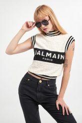Top wełniany damski BALMAIN. Swetry klasyczne damskie Balmain, z wełny, bez kołnierzyka. W wyprzedaży za 3,381.75 zł.