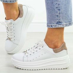 Białe skórzane sneakersy damskie na platformie Filippo Dp6739/25. Białe obuwie sportowe damskie Filippo, na jesień, z jeansu, bez zapięcia, trekkingowe. Za 239.00 zł.