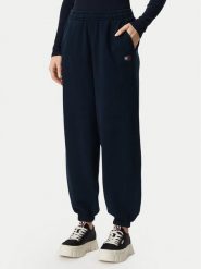 Tommy Jeans Spodnie dresowe Badge DW0DW23536 Granatowy Regular Fit. Niebieskie spodnie dresowe damskie Tommy Jeans, l, bez wzorów, z bawełny. Za 329.99 zł.