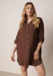 Brązowa Sukienka Oversize z Bawełny o Prostym Kroju Koszulowym Elanistra. Brązowe sukienki damskie Born2be, bez wzorów, z bawełny, eleganckie, bez ramiączek. Za 109.99 zł.