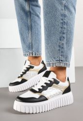 Biało-Czarne Sneakersy na Grubej Tłoczonej Podeszwie z Perforacją i Panterką Odivila. Białe obuwie sportowe damskie Born2be, z jeansu, bez zapięcia. Za 89.99 zł.