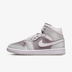Nike Air Jordan 1 Mid Photon Dust Atmosphere Sneakersy damskie. Szare obuwie sportowe damskie Nike, bez zapięcia, Nike Air Jordan. Za 469.99 zł.