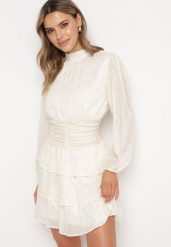 Jasnobeżowa Elegancka Sukienka z Błyszczącymi Drobinkami i Falbankami Tinaria. Brązowe sukienki damskie Born2be, bez wzorów, eleganckie, bez ramiączek. W wyprzedaży za 135.99 zł.