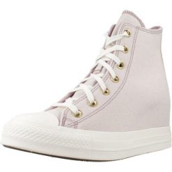 Buty CONVERSE CHUCK TAYLOR ALL STAR WEDGE Fioletowy. Fioletowe obuwie sportowe casual damskie Converse, z tkaniny, bez zapięcia. Za 387.99 zł.