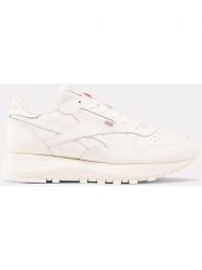 Reebok Skórzane sneakersy "Classic Leather" w kolorze białym rozmiar: 37. Białe obuwie sportowe damskie Reebok, z materiału, bez zapięcia. Za 250.35 zł.