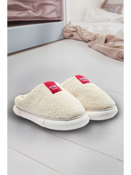 Trendyol Kapcie w kolorze kremowym rozmiar: 38. Brązowe kapcie damskie Trendyol, z materiału. Za 70.24 zł.