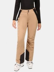 Kilpi Spodnie narciarskie "Elare" w kolorze beżowym rozmiar: 34. Brązowe spodnie dresowe damskie Kilpi, bez wzorów, z materiału. Za 347.99 zł.