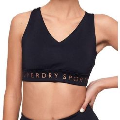 Top sportowy damski Superdry Active Studio. Niebieskie biustonosze sportowe damskie Superdry, bez wzorów. Za 123.05 zł.